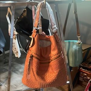 The Sak Pink Hobo Bag with Woven Detailing